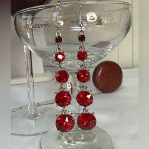 Long silvertone sparkling red rhinestone earrings